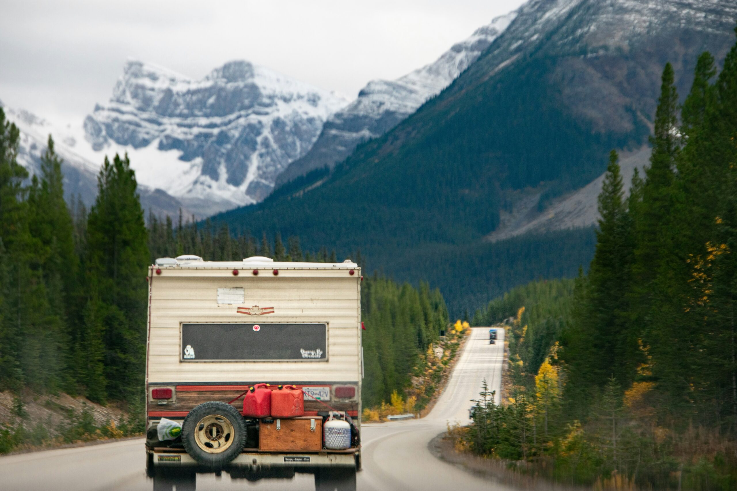 Overland truck camped in remote Wyoming landscape at dusk
